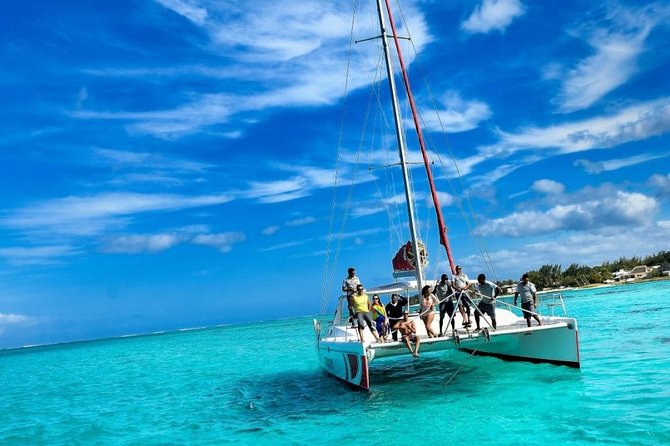 Catamaran Adventure Full Day: Ile aux cerfs,GRSE Waterfall,Snorkeling &BBQ Lunch - GRSE Waterfall, monkeys, and a short river trip