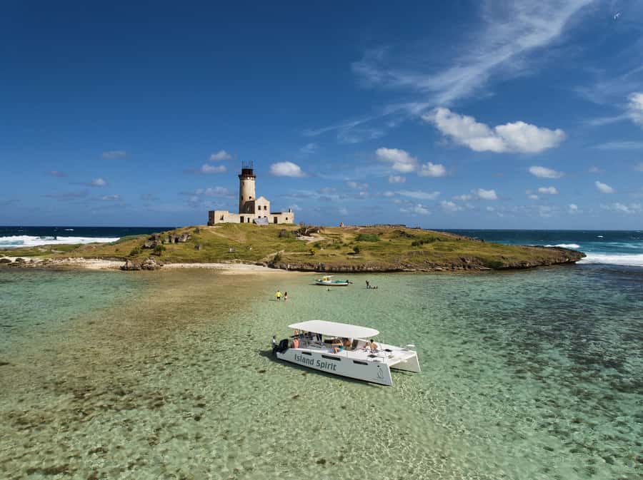 Catamaran Mauritius: South East 5 Islands Catamaran Cruises - Cruising past Mahébourg and Grand Port