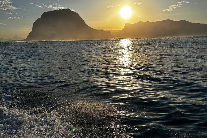 Eco-friendly Dolphin Watching Tour in Mauritius - Breakfast with coffee, croissants, and a coastal view