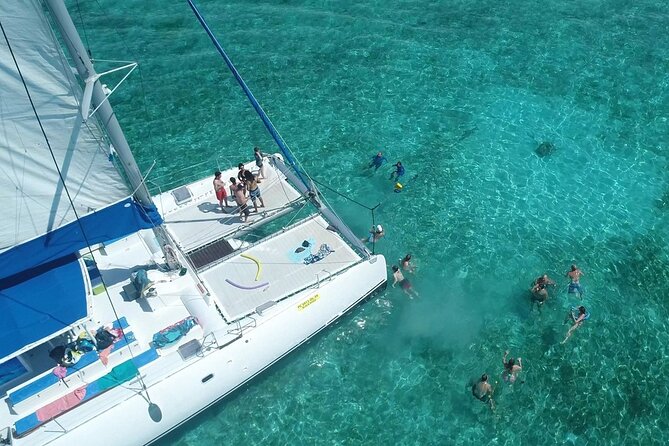 Full Day Catamaran Cruise on shared basis to Bénitiers Island - Sailing west from Grande Rivière Noire