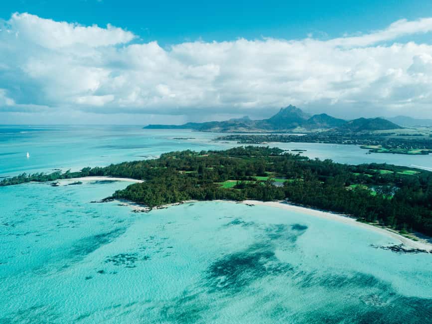 Full-day Catamaran Cruise to Ile aux Cerfs with Lunch - Boarding the 42-foot catamaran at Trou d’Eau Douce