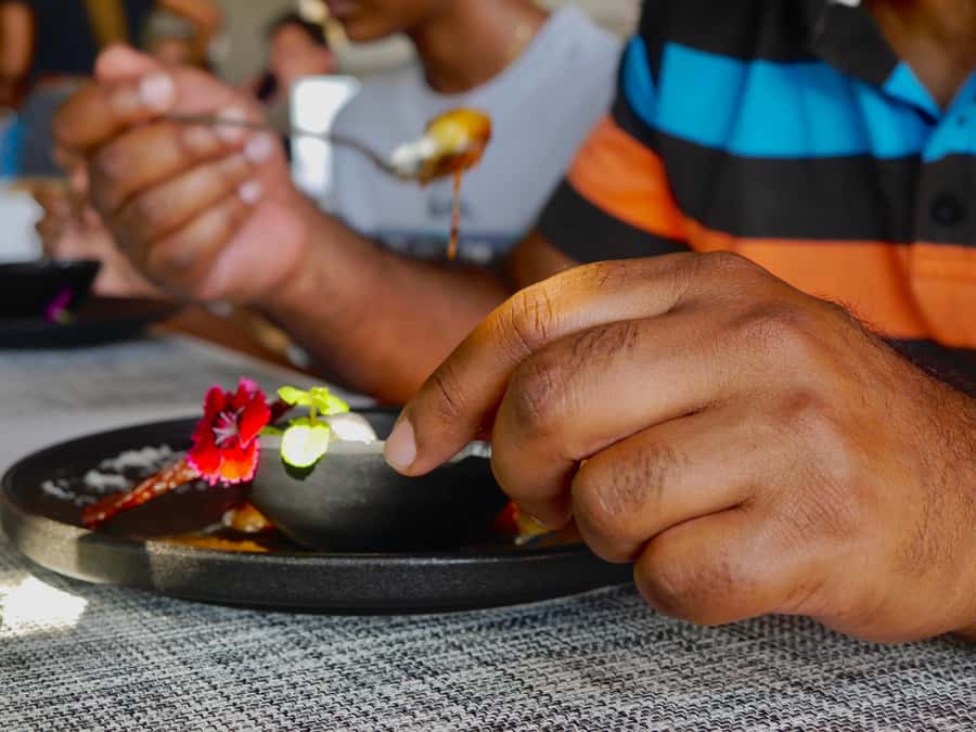 Grand Baie: Coastal Cuisine & Culture Walking Tour - Sunset Boulevard and the final seafood meal