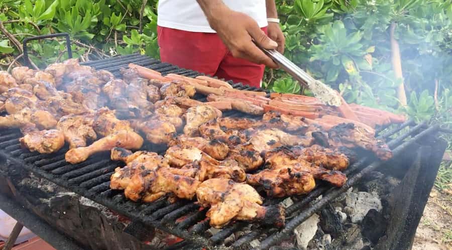Grand Bay: Catamaran Cruise to Flat Island with BBQ Lunch - Setting off from Grand Baie beach