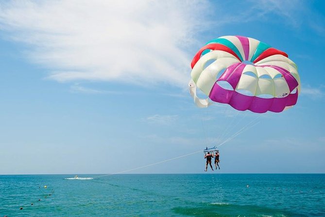 Ile aux Cerf: Speed boat with Parasailing & Tube Riding and Lunch - Undersea walking in the coral garden