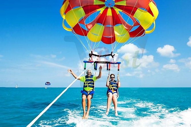 Ile aux Cerf: Speed boat with Parasailing & Tube Riding and Lunch - Parasailing above the east-coast lagoon