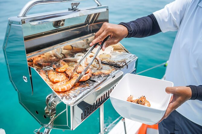 Mauritius: Catamaran Cruise to Ile Aux Cerfs with BBQ Lunch - BBQ lunch, local drinks, and the social side of the boat