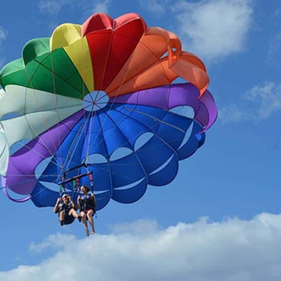 Mauritius: Watersport Adventure Day with Lunch and Pickup - Parasailing adds a quieter kind of thrill