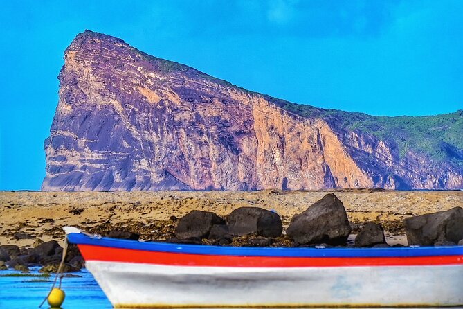 Private A/C CAR Guided FULL DAY tour North of Mauritius - Beaches, nightlife, and Champ de Mars add local texture
