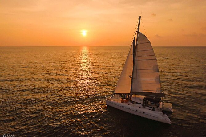 Private Exclusive Sundowner catamaran with Dinner & Transfer - The possible snorkeling stop