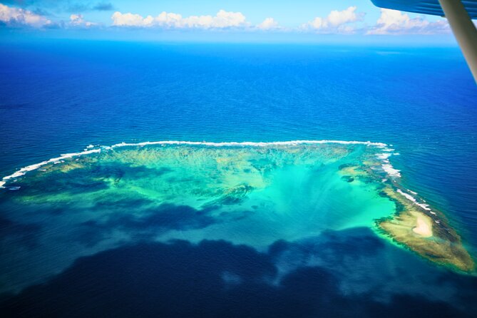 Seaplane Tours over the turquoise lagoon of the East of Mauritius - Amber Island and the changing colors of the lagoon