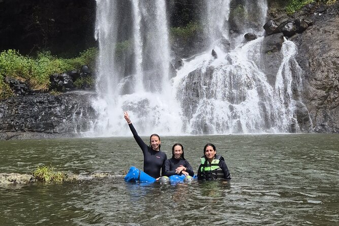 Tamarind Falls Abseiling - Swimming beneath the falls